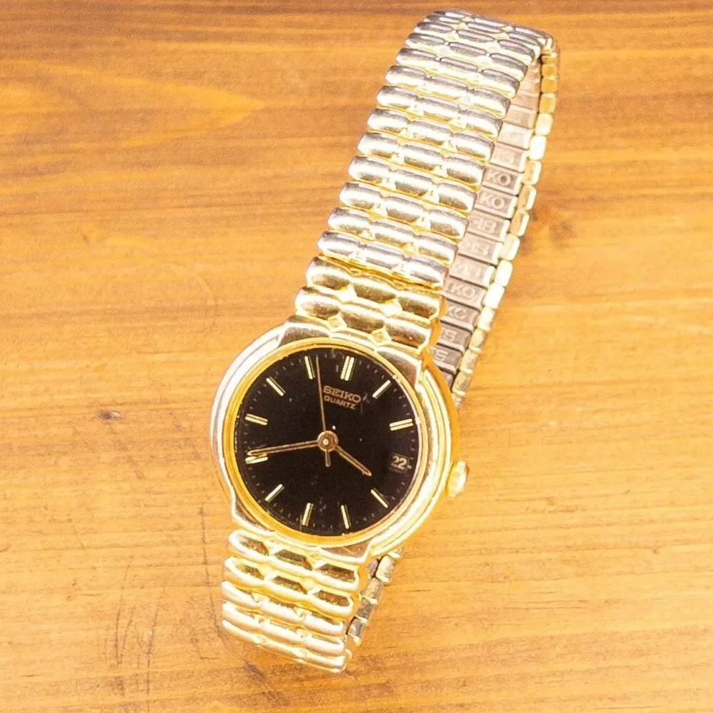 Vintage Seiko 7N82-0038 Ladies Quartz Watch Gold Tone Black Dial Date May 1994
